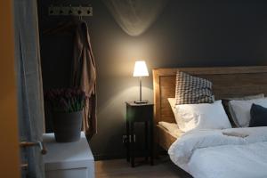 Postel nebo postele na pokoji v ubytování B&B Les Dépendances