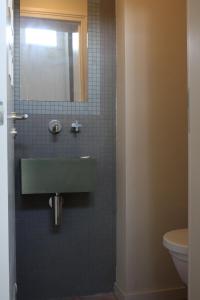 Koupelna v ubytování B&B Les Dépendances