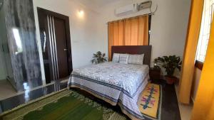 Postel nebo postele na pokoji v ubytování Sublime Homestay