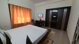 TV o dispositivi per l'intrattenimento presso Sublime Homestay