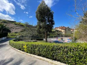 Swimmingpoolen hos eller tæt på Piscina comunitaria y parking en Mogro