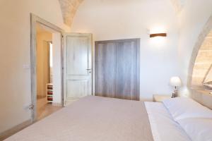 Кровать или кровати в номере VILLA Alessandra