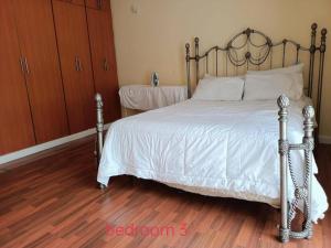 Postel nebo postele na pokoji v ubytování Lux Suites Karen Family Bungalow