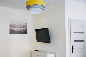 Telewizja i/lub zestaw kina domowego w obiekcie Narutowicza 5 Apartments