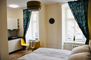 Łóżko lub łóżka w pokoju w obiekcie Narutowicza 5 Apartments