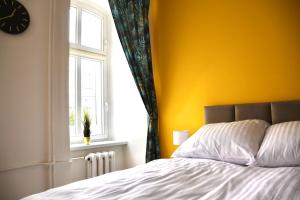 Łóżko lub łóżka w pokoju w obiekcie Narutowicza 5 Apartments
