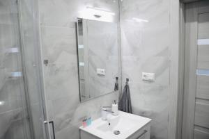 Łazienka w obiekcie Narutowicza 5 Apartments