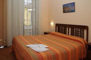 Katil atau katil-katil dalam bilik di DolceVitaSorrento Guest House
