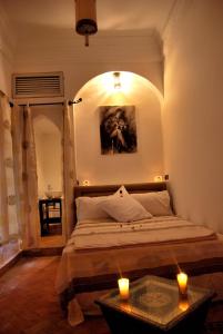 Postel nebo postele na pokoji v ubytování Hotel Riad Todos