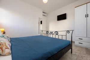 Postel nebo postele na pokoji v ubytování Apartment Apsyrtides