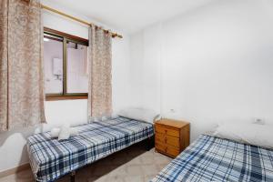 Postel nebo postele na pokoji v ubytování Apartamento Emeterio