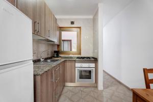Kuchyň nebo kuchyňský kout v ubytování Apartamento Emeterio