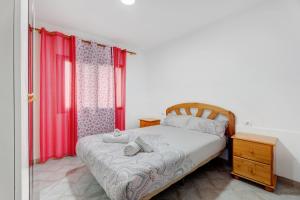 Postel nebo postele na pokoji v ubytování Apartamento Emeterio