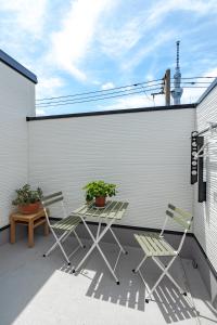 Balkón nebo terasa v ubytování SKYTREE HOUSE