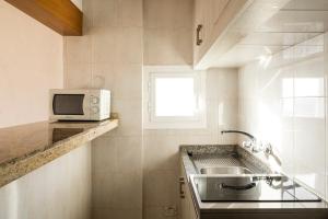 Kuchnia lub aneks kuchenny w obiekcie Apartamentos El Moro