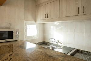Kuchnia lub aneks kuchenny w obiekcie Apartamentos El Moro