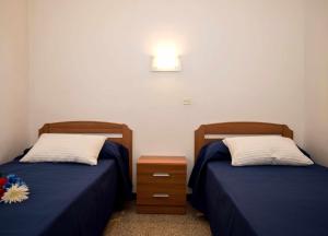 Postel nebo postele na pokoji v ubytování Caoca A6 Apartamento con vistas privilegiadas