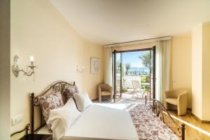 Postel nebo postele na pokoji v ubytování Hotel dP Olbia - Sardinia