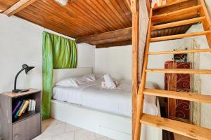 Postel nebo postele na pokoji v ubytování Jardin au Port Vallon des Auffes