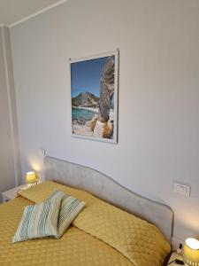 A bed or beds in a room at Ca'Mea