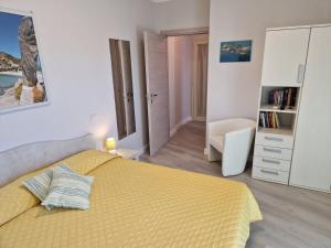 A bed or beds in a room at Ca'Mea