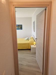 A bed or beds in a room at Ca'Mea