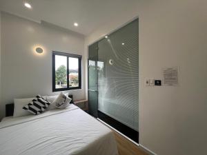 Ein Bett oder Betten in einem Zimmer der Unterkunft ANH’s HOUSE