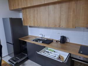 Cucina o angolo cottura di Apartman Centar Bečej