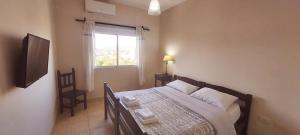 Postel nebo postele na pokoji v ubytování Amancay, hermoso departamento en Salta