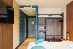 Posteľ alebo postele v izbe v ubytovaní Grand Hotel Riva