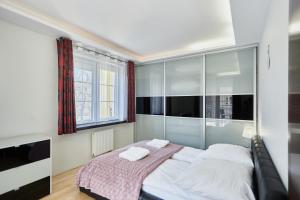 Postel nebo postele na pokoji v ubytování Villa Park by Baltic Home Świnoujście