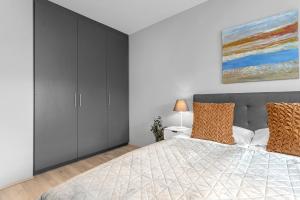 Postel nebo postele na pokoji v ubytování Tower Apartments