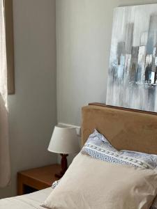 Postel nebo postele na pokoji v ubytování bel appartement équipé et spacieux avec vue magnifique sur mer