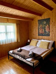 Postel nebo postele na pokoji v ubytování Eszter-Ház + 6 fotografií