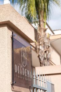 a sign on the side of a building at DIADEMA Luxury Suite in Nardò