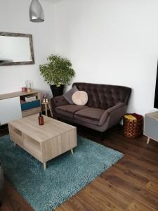 A seating area at Apartment Wigo