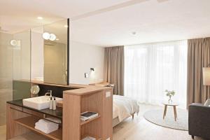 Postel nebo postele na pokoji v ubytování Hotel Schwarzschmied