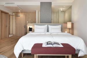 Postel nebo postele na pokoji v ubytování Hotel Schwarzschmied