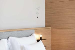 Postel nebo postele na pokoji v ubytování Hotel Schwarzschmied