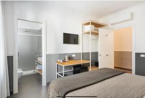 Postel nebo postele na pokoji v ubytování Delle rose inn