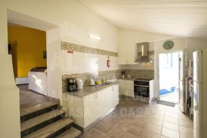 Η κουζίνα ή μικρή κουζίνα στο Casa Aconchego by AcasaDasCasas