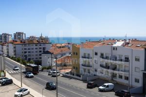 arial view of a city with cars on a road at Home Sweet Home by ACasaDasCasas in Ericeira