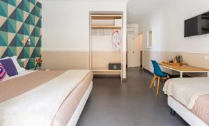 Postel nebo postele na pokoji v ubytování Delle rose inn