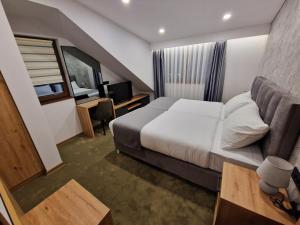 Voodi või voodid majutusasutuse Lakeside toas