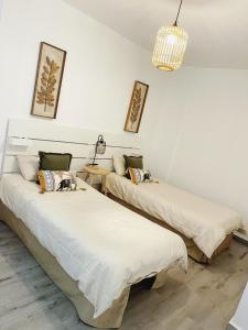 Postel nebo postele na pokoji v ubytování Casa Yaya