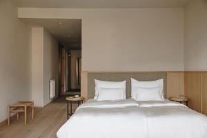 Postel nebo postele na pokoji v ubytování Hotel Schwarzschmied