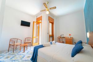 Łóżko lub łóżka w pokoju w obiekcie Hotel San Pietro