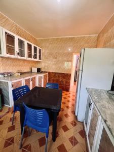 Kuchyň nebo kuchyňský kout v ubytování Petra Gold Inn Apartments