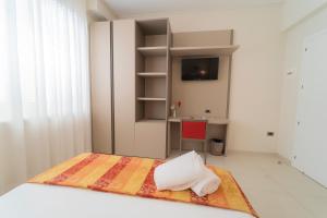 Telewizja i/lub zestaw kina domowego w obiekcie Hotel San Pietro