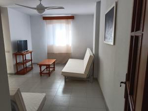 Telewizja i/lub zestaw kina domowego w obiekcie Apartamentos Mary